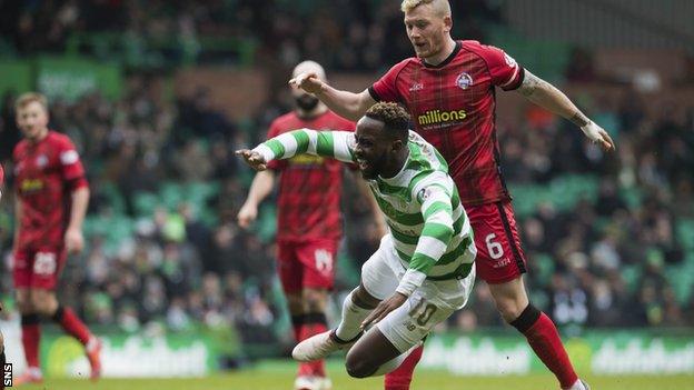 Morton's Michael Doyle fouls Celtic's Moussa Dembele