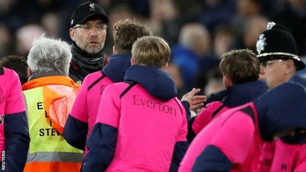 Liverpool manager Jurgen Klopp spoke to an Everton ball boy after his side's 1-1 draw at Everton