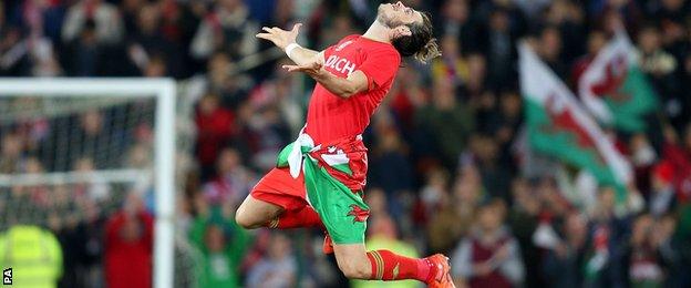 Wales goalscorer Gareth Bale celebrates at full-time as Wales qualify for Euro 2016