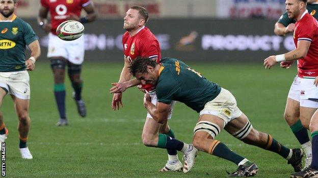 Finn Russell is tackled against South Africa