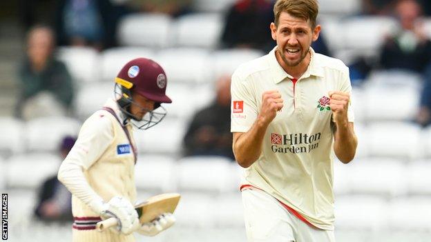 Tom Bailey celebrates a wicket for Lancashire against Somerset