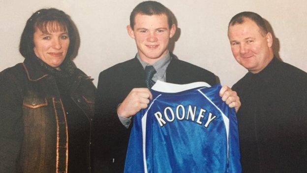 Wayne Rooney with his mum and dad