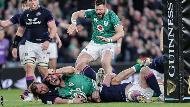 Josh van der Flier scores Ireland's third try against Scotland