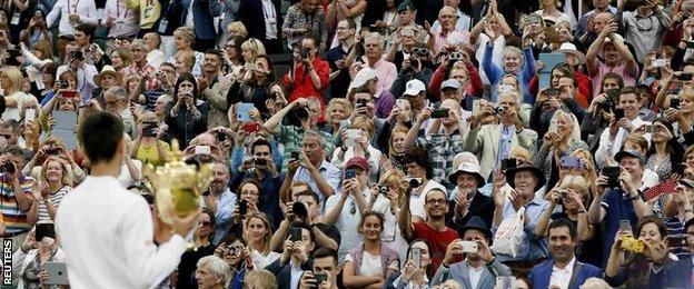 Novak Djokovic celebrates winning Wimbledon