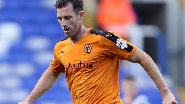 Newcastle defender Mike Williamson in action for Wolves