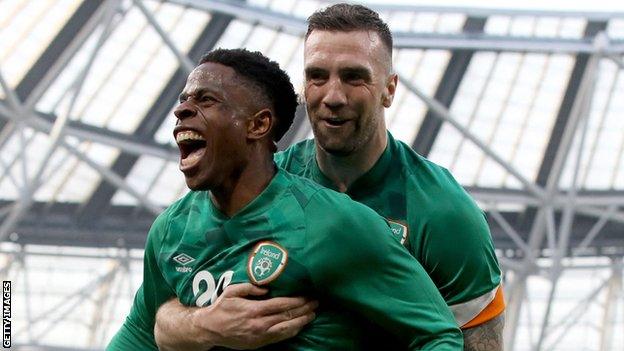 Ogbene celebrates with Shane Duffy