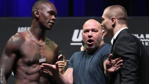 Israel Adesanya faces off with challenger Marvin Vettori