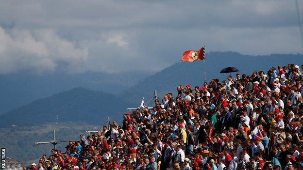 Ferrari flag in a packed main stand at Sochi