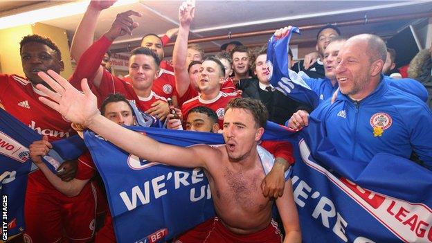 Accrington Stanley celebrate promotion in the changing rooms after beating Yeovil Town 2-0