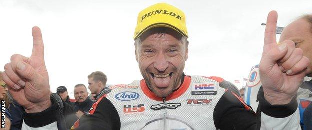 Bruce Anstey celebrates his North West 200 Supersport win in 2014