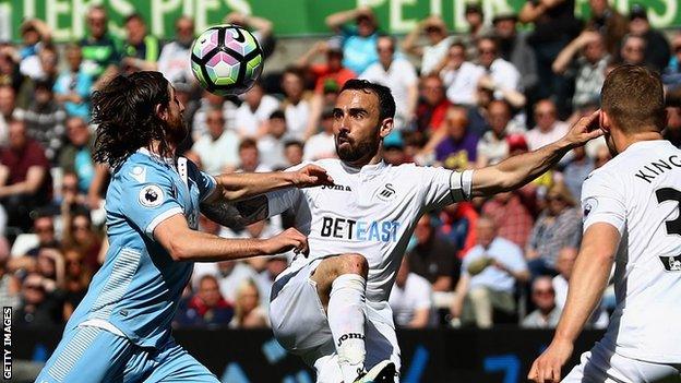 Leon Britton in action for Swansea City against Stoke City