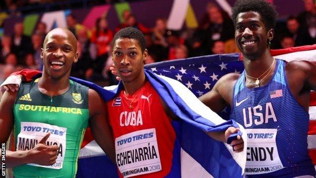 Cuban Juan Miguel Echevarria (centre) beat Luvo Manyonga (left) and Marquis Dendy to win a world title aged 19