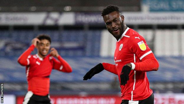 Daryl Dike (right) has now scored nine goals in 17 games for Barnsley