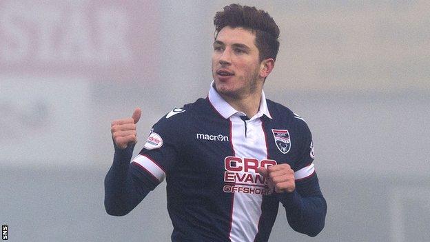 Chris Routis celebrates scoring the opening goal for Ross County