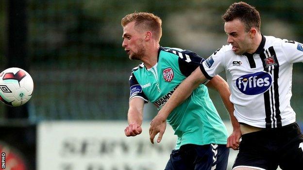 Derry midfielder Lucas Schubert gets in front of Dundalk's Robbie Benson