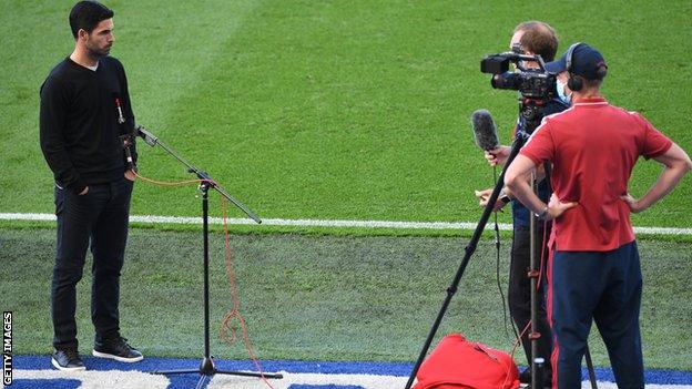 Mikel Arteta is interviewed before a game