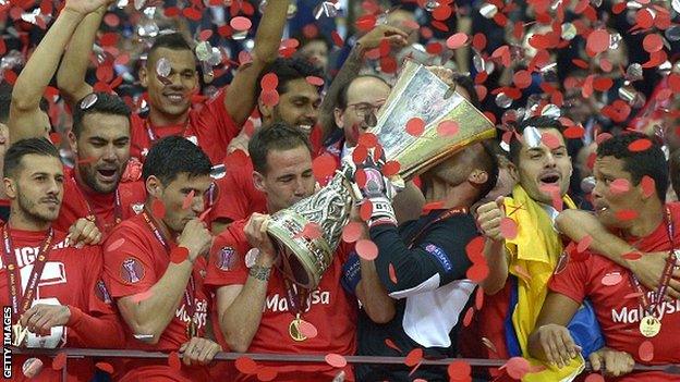 Sevilla players celebrate winning the 2015 Europa League