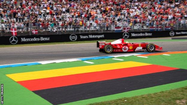 Mick Schumacher son of former F1 champion, steers his fathers championship winning Ferrari F2004 during a demonstration ahead of the German Grand Prix