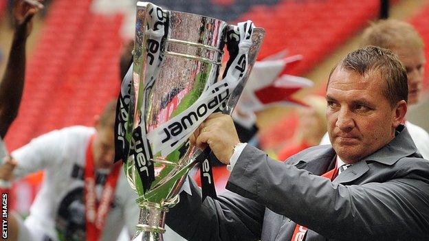 Brendan Rodgers celebrates guiding Swansea to the Premier League in the play-off final against former club Reading