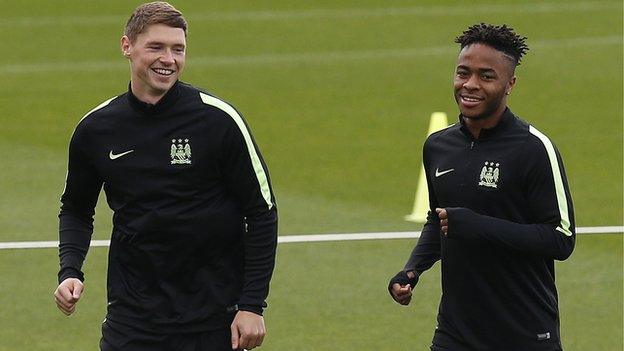 George Evans with Raheem Sterling