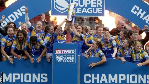 Leeds lift the Women's Super League trophy