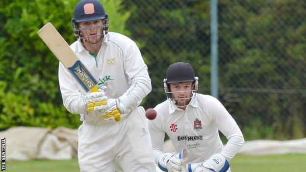 Alex Thomson made 100 runs in the match for Staffordshire against Cumberland at Longton in June. The visitors' wicketkeeper was Gary Knight