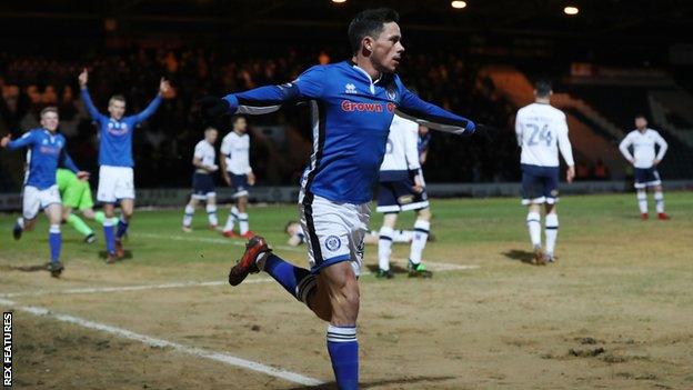 Ian Henderson celebrates his goal