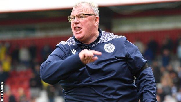 Steve Evans has been charged with misconduct by the FA after his red card against Northampton.