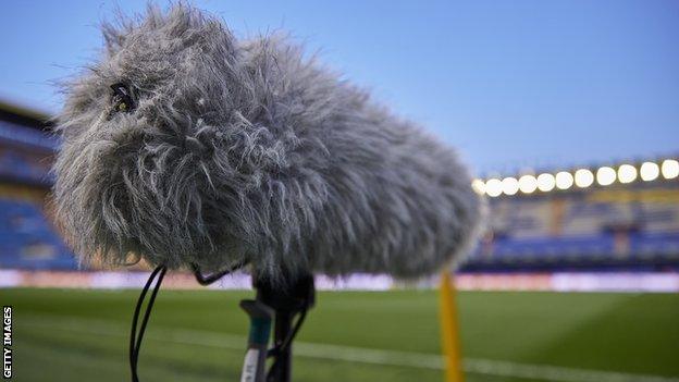 A microphone in a football stadium