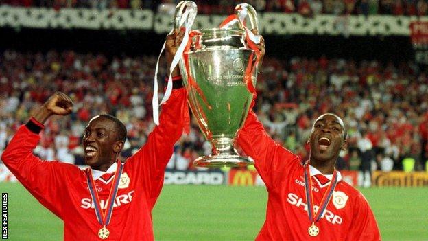 Dwight Yorke (left) and Andy Cole celebrate after helping Manchester United win the Champions League in 1999