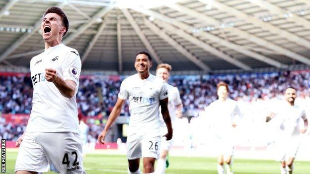 Tom Carroll celebrates goal