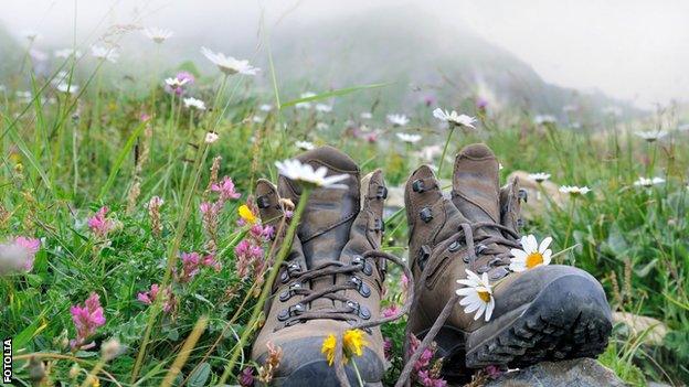 walking shoes in a field