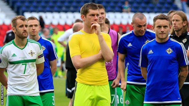 Michael McGovern (centre) is left disappointed as Northern Ireland exit Euro 2016