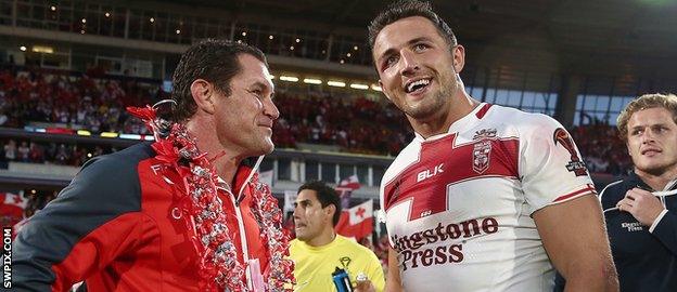 Kristian Woolf chats to Sam Burgess after the 2017 World Cup semi-final
