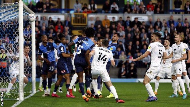 Ryan Tafazolli scores for Wycombe