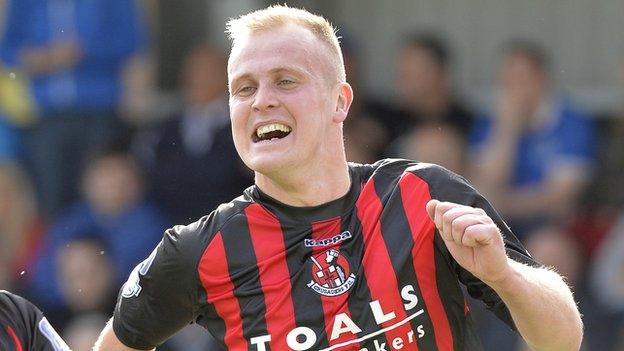 Jordan Owens celebrates after putting Crusaders ahead in the first half at Seaview