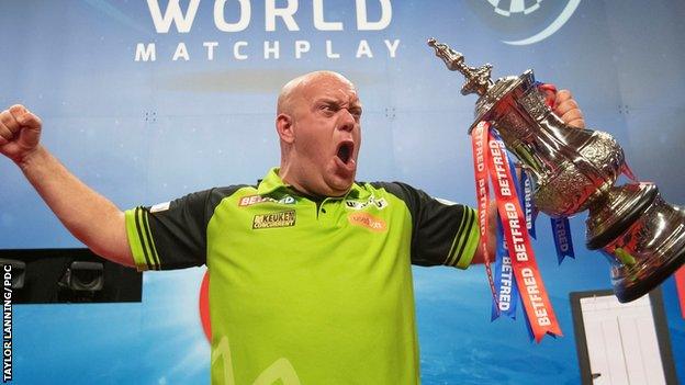 Michael van Gerwen celebrating with his World Matchplay title