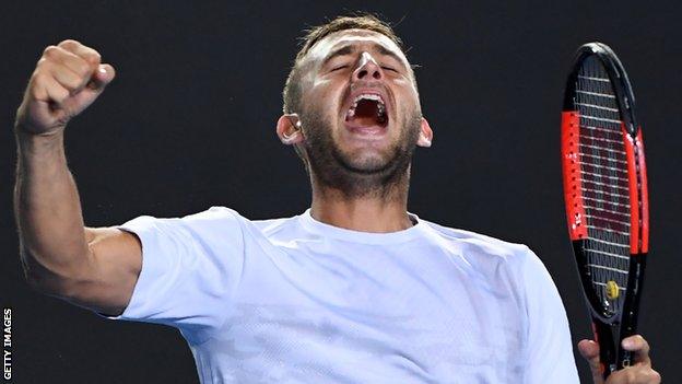 Dan Evans celebrates his four-set win over seventh seed Marin Cilic