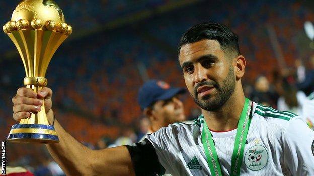 Algeria forward Riyad Mahrez with the Africa Cup of Nations trophy