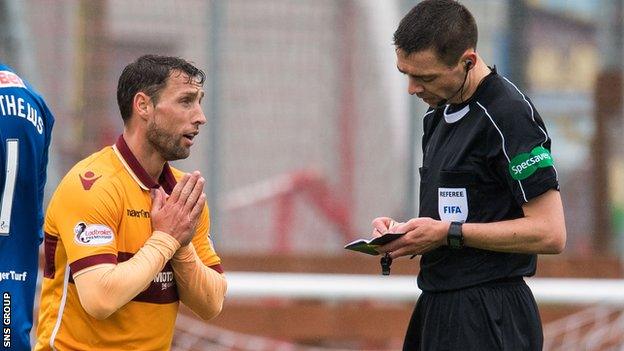 Motherwell striker Scott McDonald pleads his case to referee Kevin Clancy