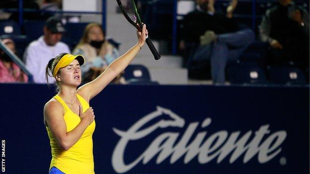 Elina Svitolina celebrating a point by putting her hand on her chest during her game against Anastasia Potapova