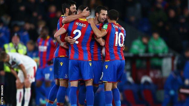 Crystal Palace players celebrate at the end.