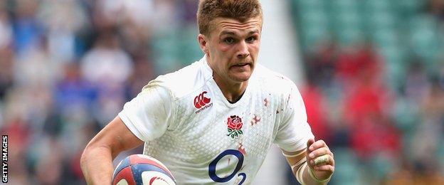 Henry Slade runs with the ball on his Test debut against France