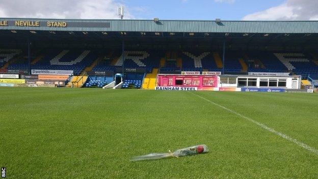 A rose was laid on the pitch at Gigg Lane by former director Joy Hart, the daughter of former Bury captain, coach and manager Les Hart, to symbolise the fan's love for the club