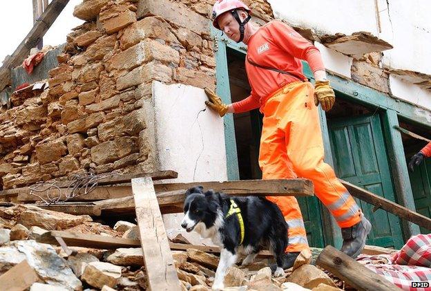 Darcy the dog and handler John Ball in Nepal