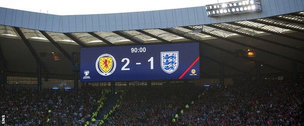 Hampden scoreboard shows Scotland leading England 2-1