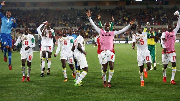 Senegal celebrate their victory over South Africa in Durban