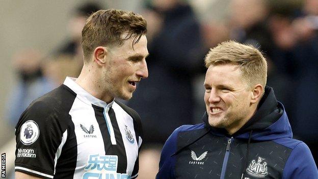 Newcastle striker Chris wood (left) and manager Eddie Howe