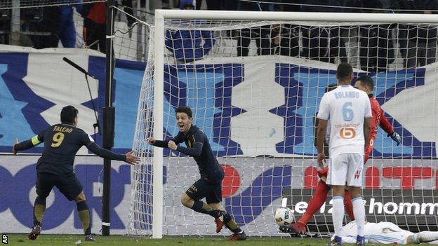 Monaco's players celebrate scoring against Marseille