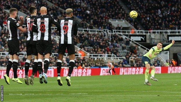 Harry Wilson takes a free kick for Bournemouth against Newcastle